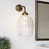 Clifton Fluted Bathroom Wall Light with Eliot Arm  in Antiqued Brass