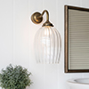 Clifton Fluted Bathroom Wall Light with Blake Arm  in Antiqued Brass