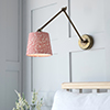 Articulated Wall Light in Antiqued Brass