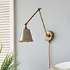 Club Articulated Plug-In Wall Light in Antiqued Brass