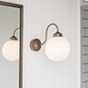 Compton Opal Bathroom/Outdoor Wall Light in Antiqued Brass