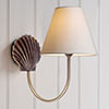 Single Saunton Bathroom Light in Antiqued Brass