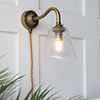 Newton Fine Fluted Plug-In Wall Light in Antiqued Brass