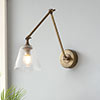 Newton Fine Fluted Articulated Wall Light in Antiqued Brass