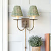 Smuggler Plug-In Wall Light in Antiqued Brass