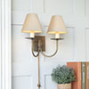 Smuggler Plug-In Wall Light in Antiqued Brass