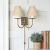 Smuggler Plug-In Wall Light in Antiqued Brass