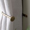 Small Button Holdback in Lacquered Antiqued Brass